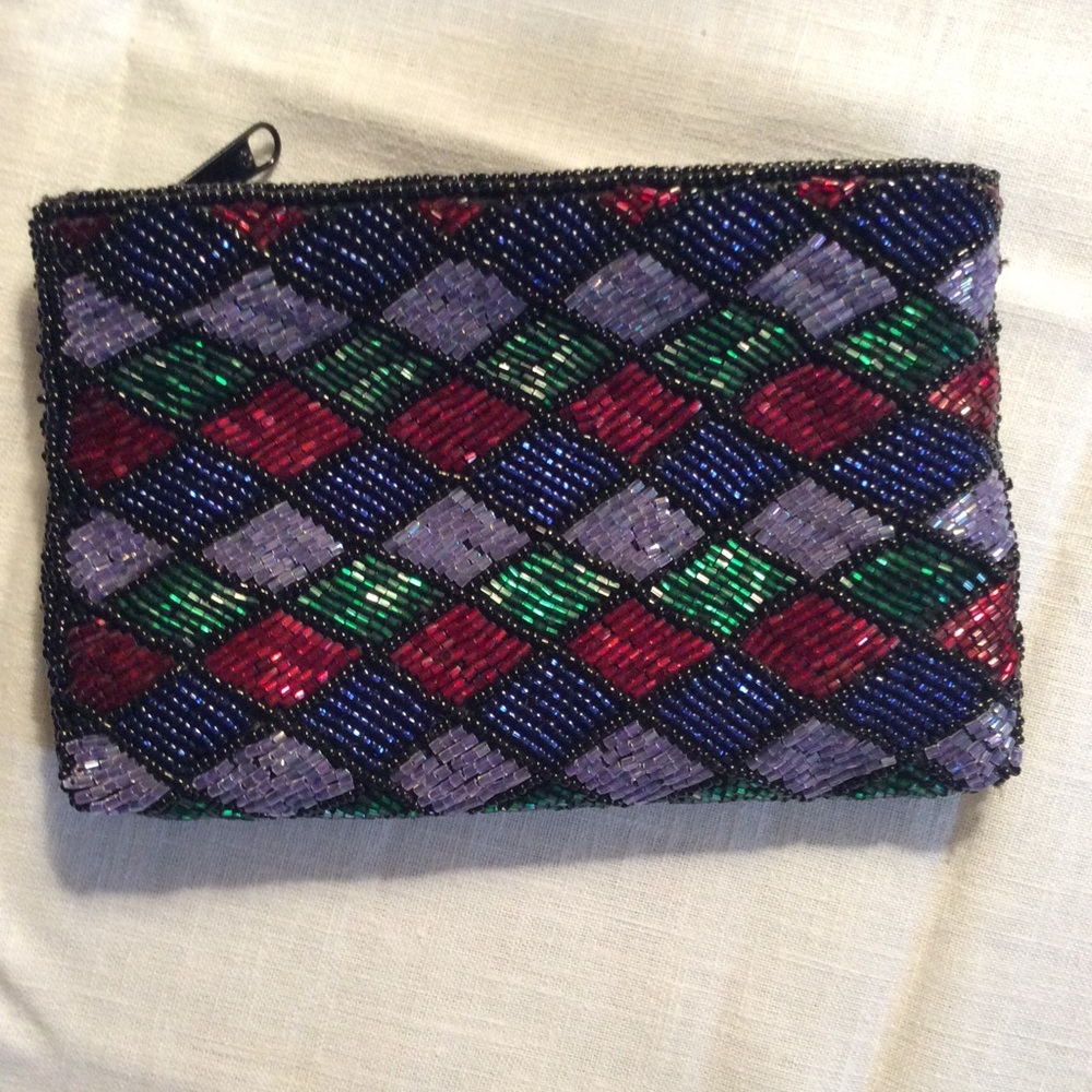 Vintage small zippered clutch from Neiman Marcus.